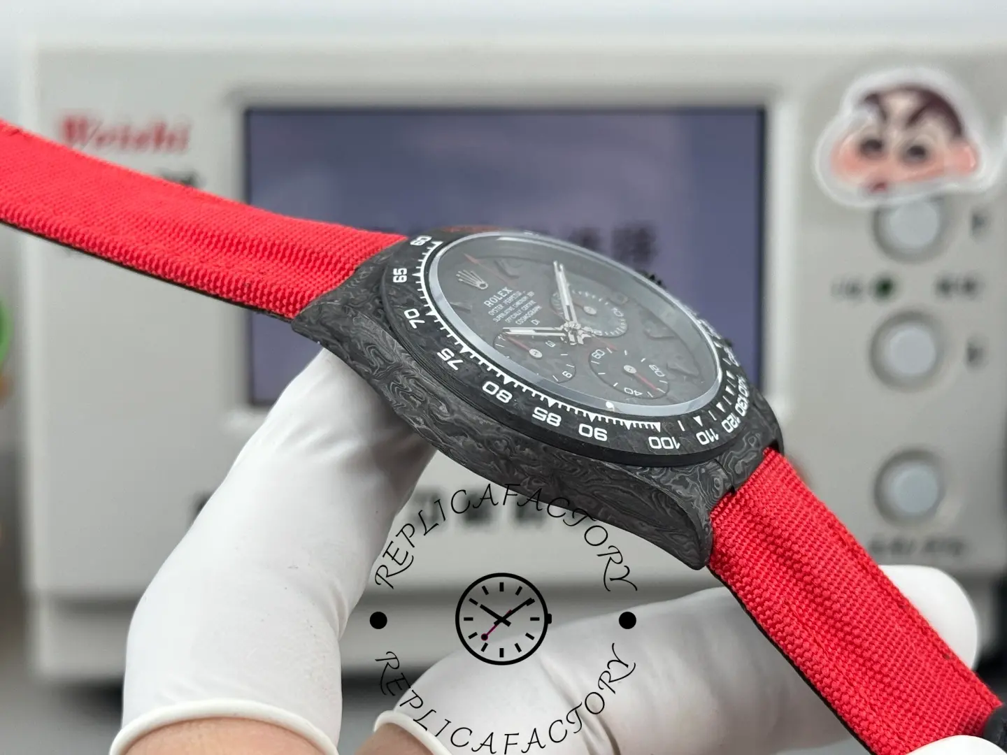 Side profile of Rolex Daytona DIW NTPT Carbon Red Edition showing carbon case.
