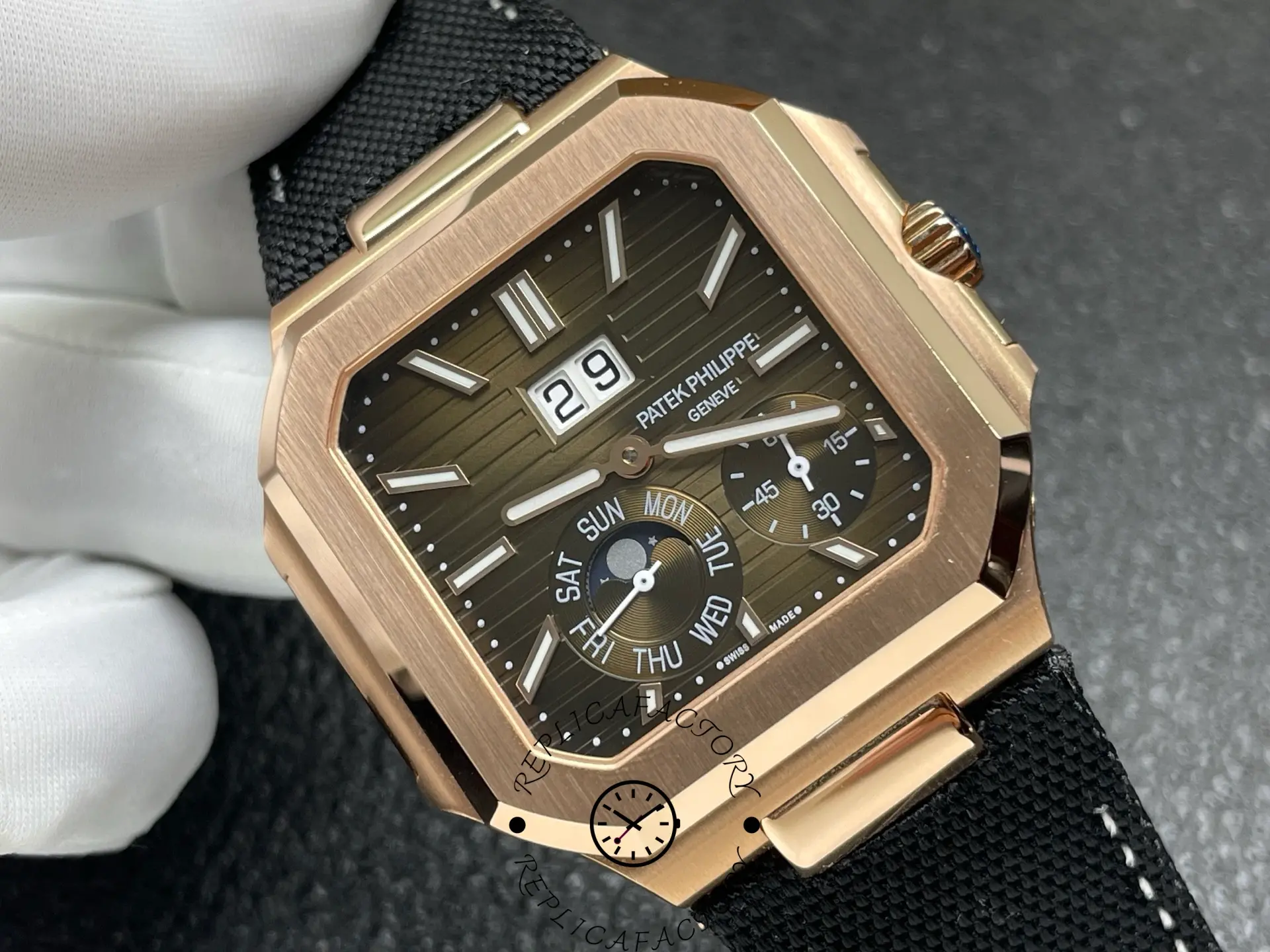 Close-up view of the Patek Philippe 5822R replica showing hands and markers.