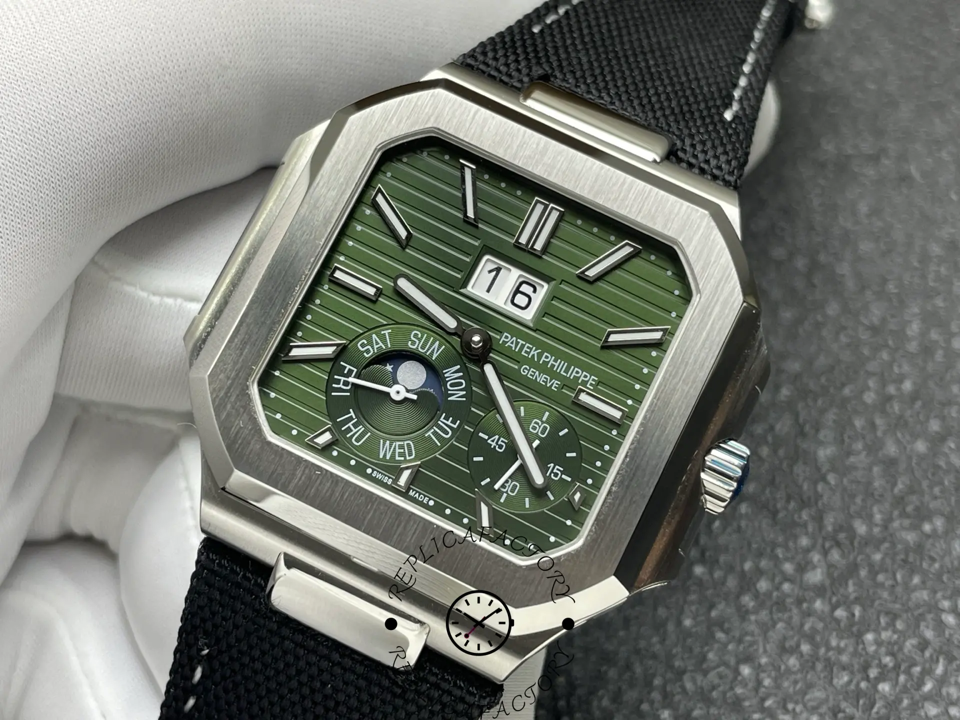 Side-angled view of Patek Philippe 5822P showing case edges and dial layout.