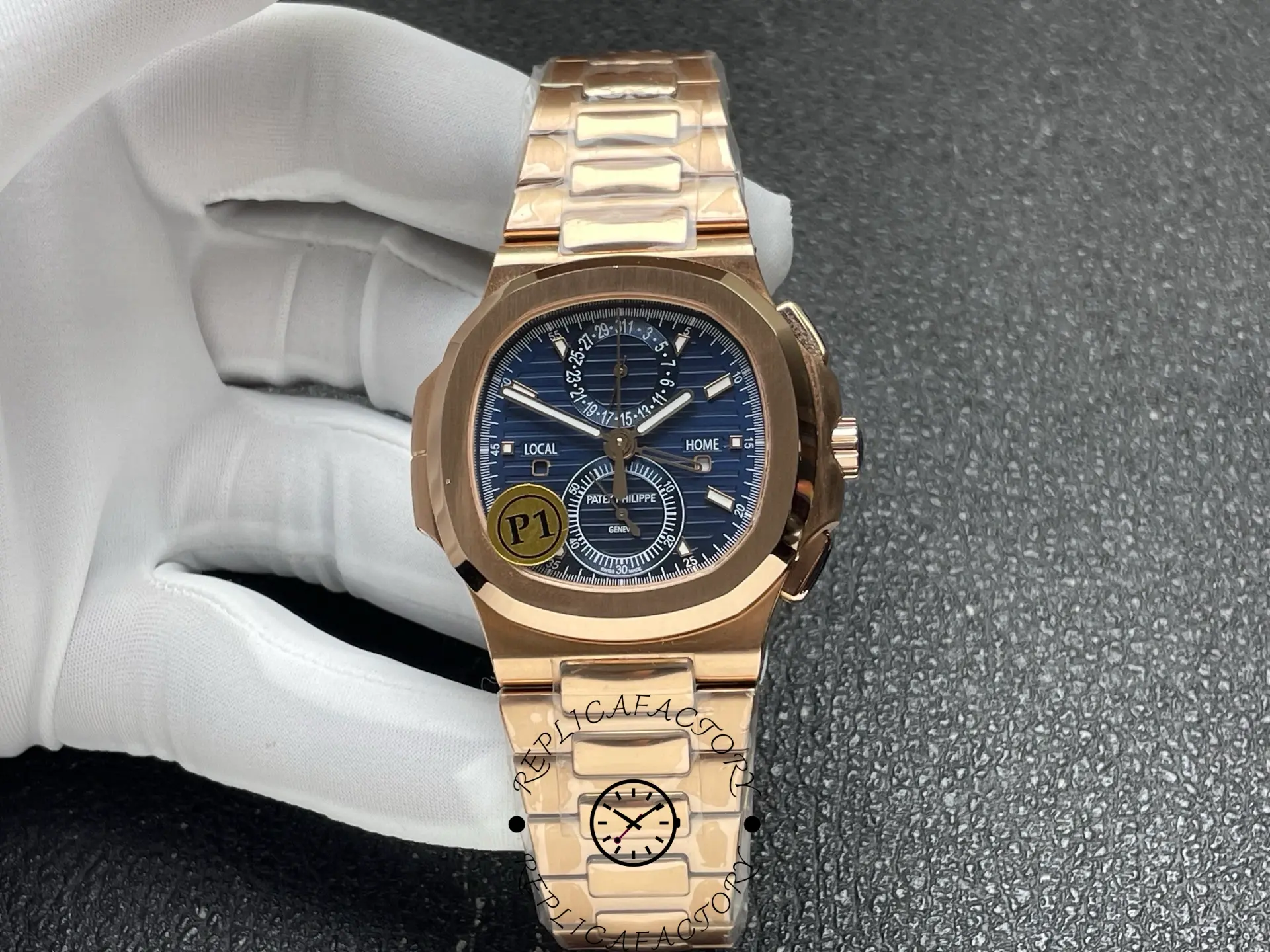 Patek Philippe 5990/1R-001 replica held in glove showing dial and bracelet.