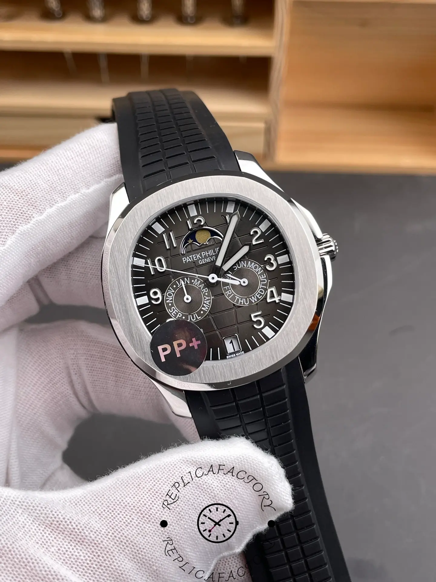 Detailed front shot of Aquanaut 5261R replica dial with embossed grid texture.