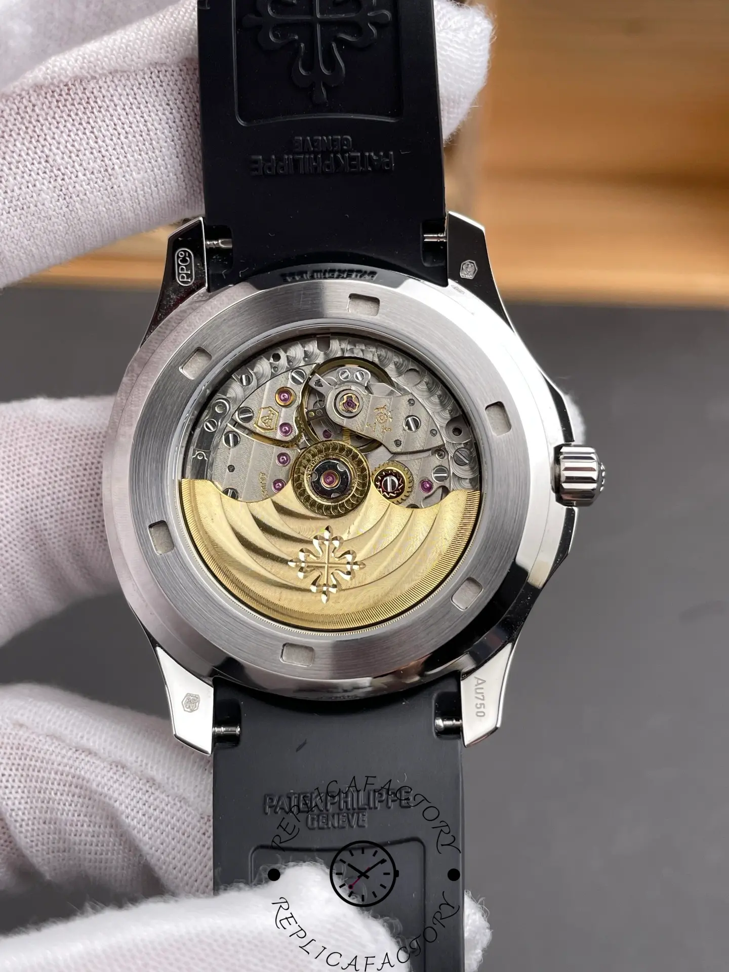 Exhibition caseback of Aquanaut 5261R replica showing decorated rotor.