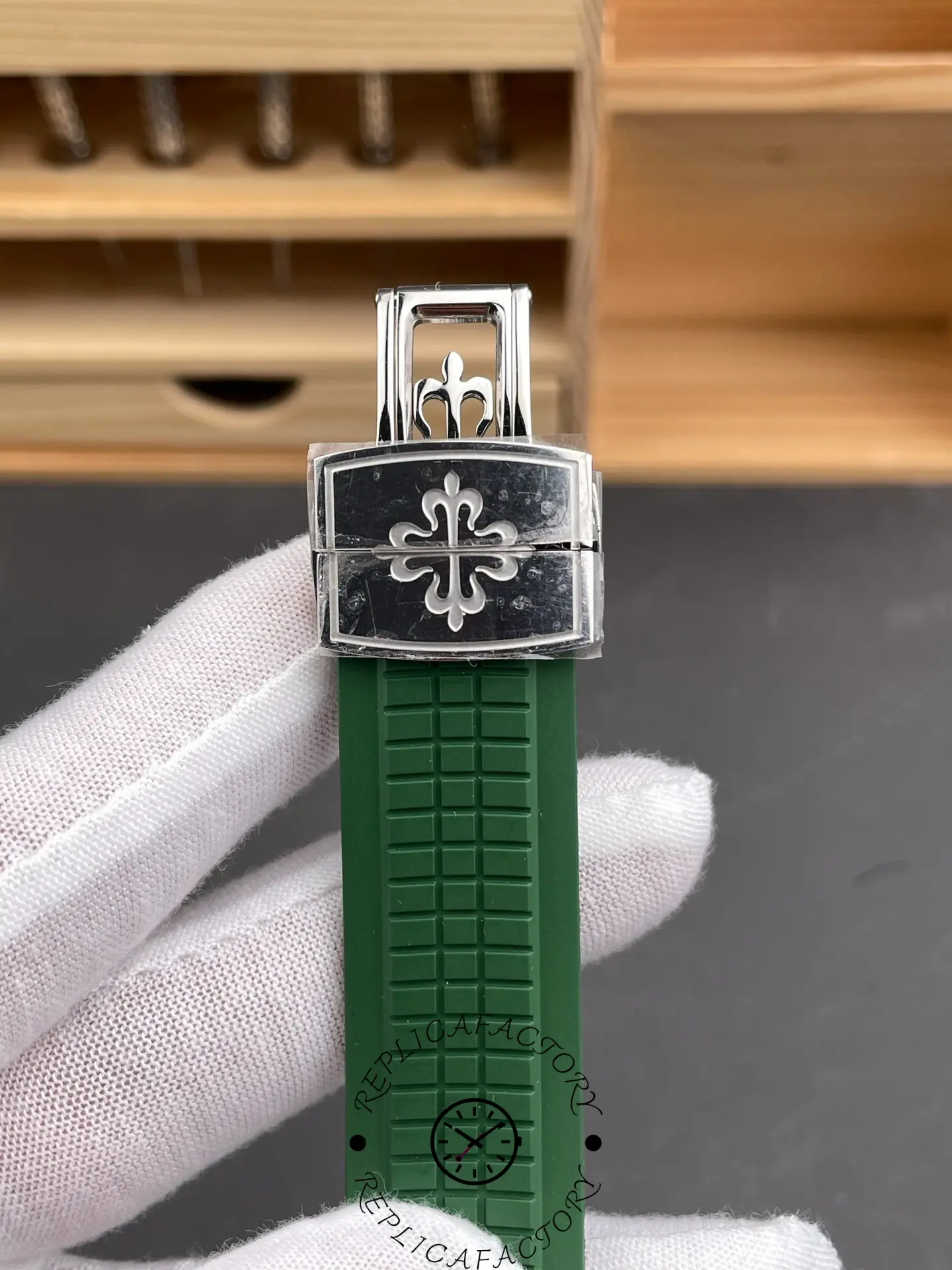 Clasp engraving close-up of the Patek Philippe Aquanaut 5261R replica strap hardware.