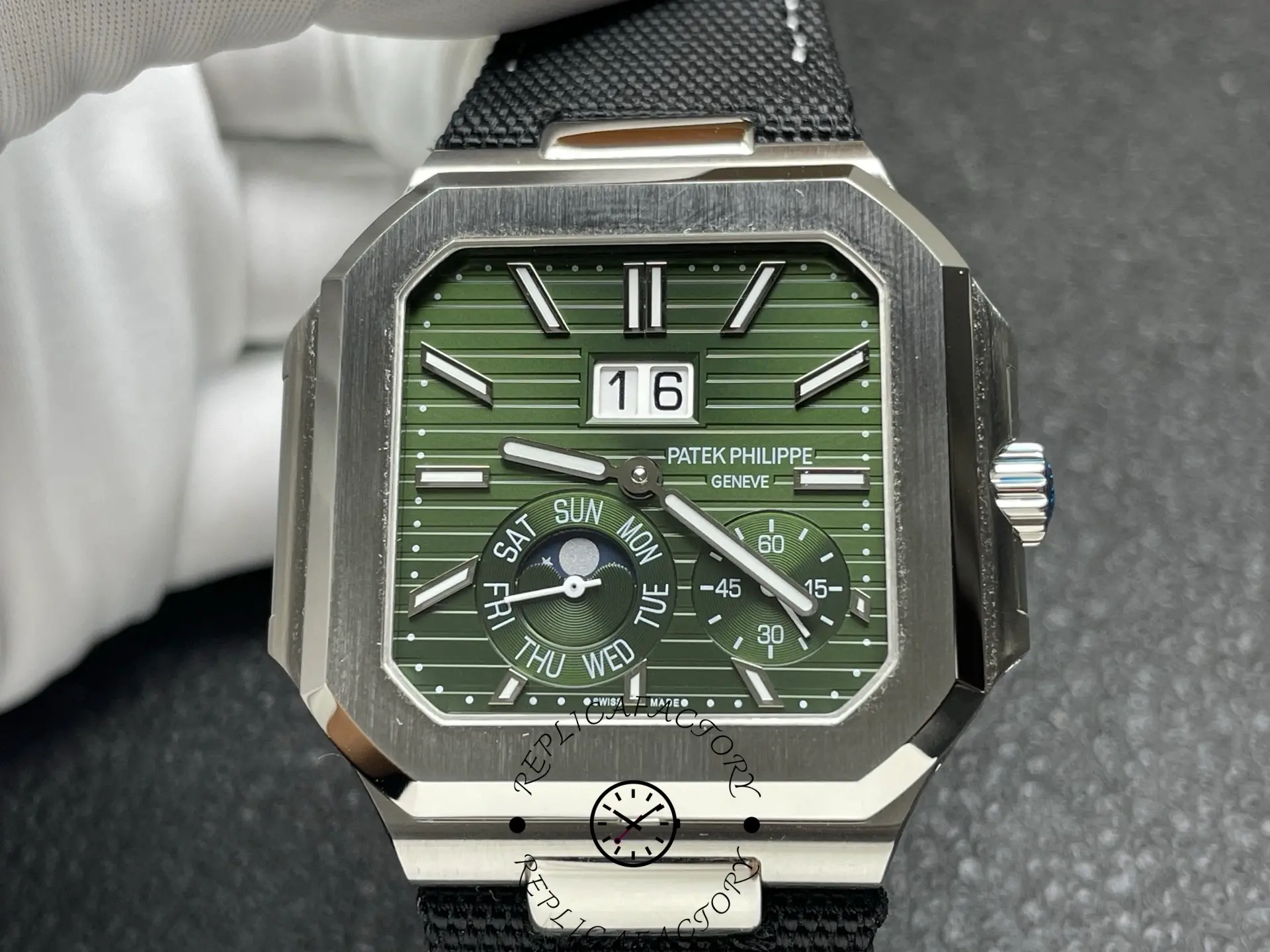 Detailed view of Patek Philippe 5822P dial with moonphase and subdials.