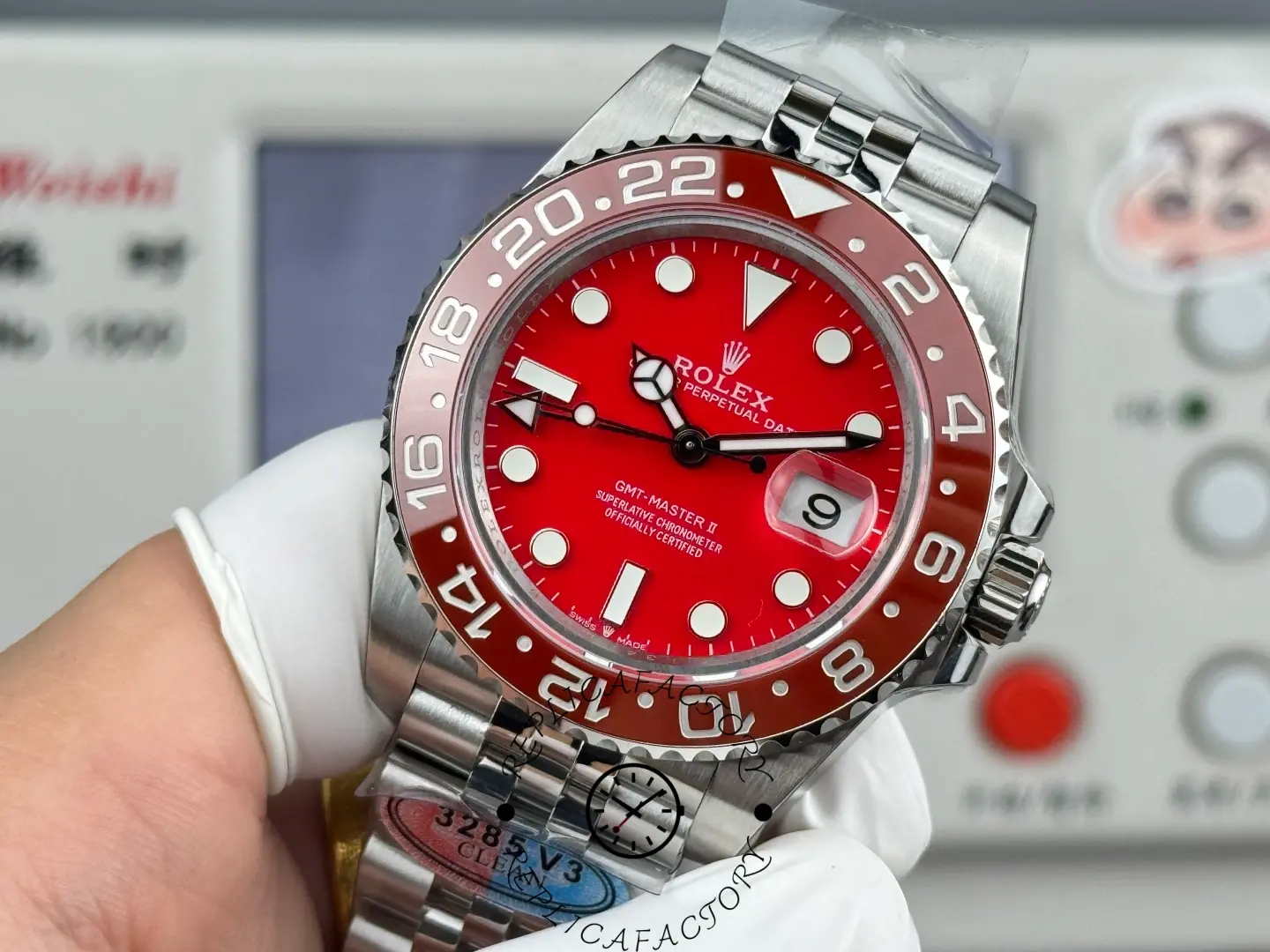 Oblique view of Rolex GMT-Master II 126710 Red Edition replica showing bezel shine and bracelet links.