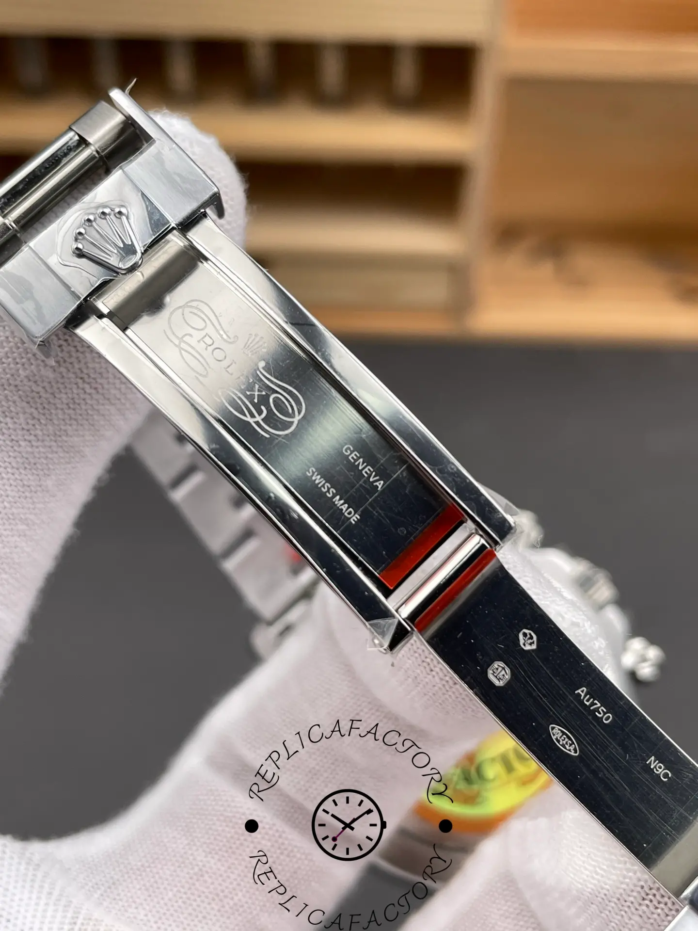 Clasp interior of Rolex Daytona 116509-0073 replica with engraved markings.