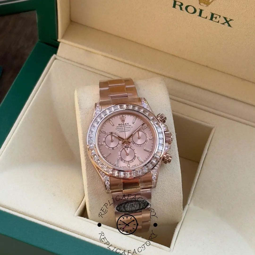 Rolex Daytona 126595TBR replica displayed in box with rose gold bracelet and baguette bezel.