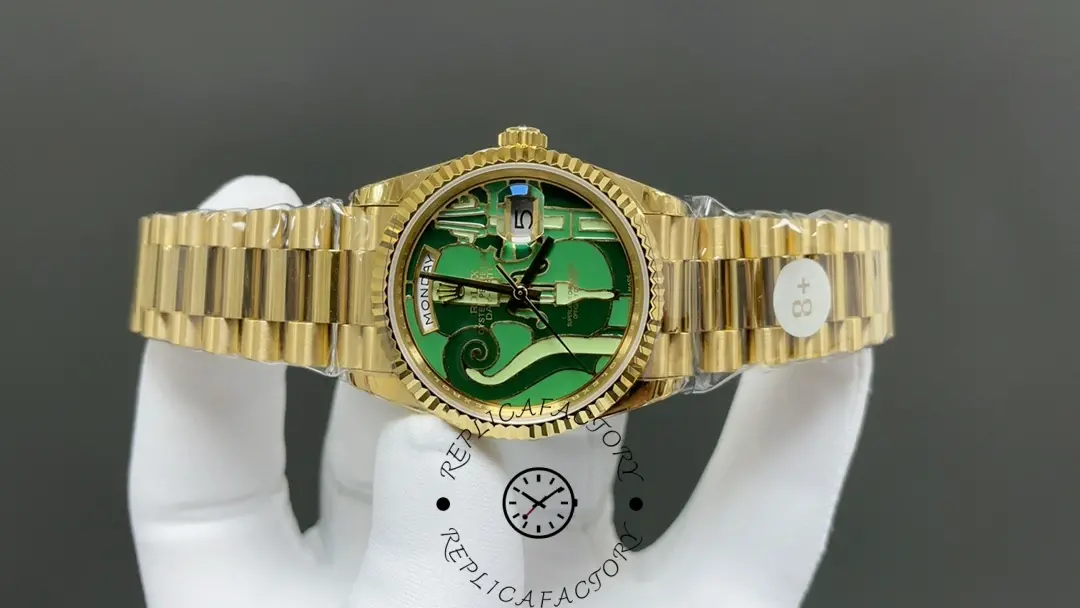 Side angle of Rolex 128238-VIO showing green dial and gold President bracelet.