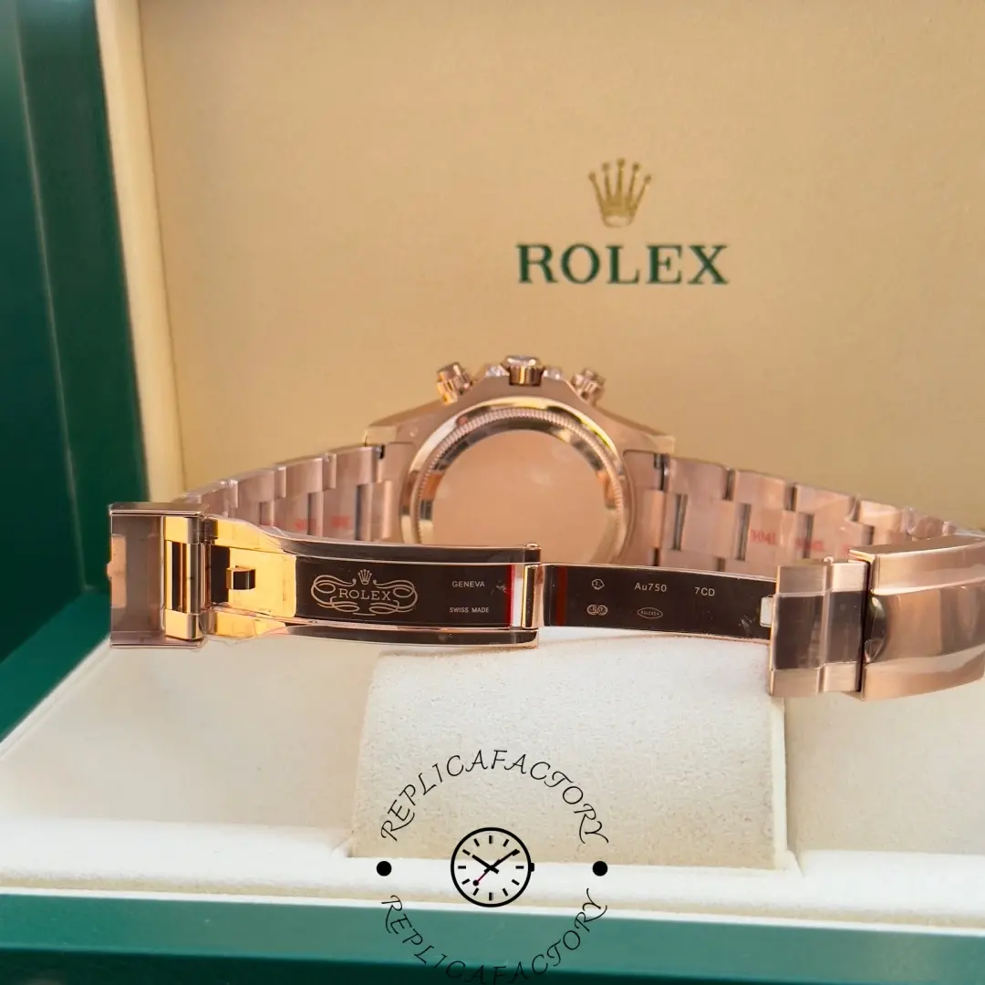 Open clasp view of Rolex Daytona 126595TBR replica revealing engraved inner clasp.