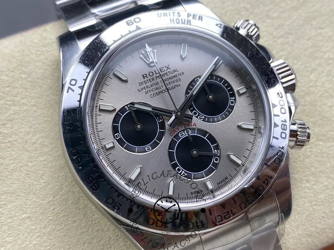 Angled front close-up of Rolex Daytona 126509-0003 featuring detailed dial printing and polished bezel.