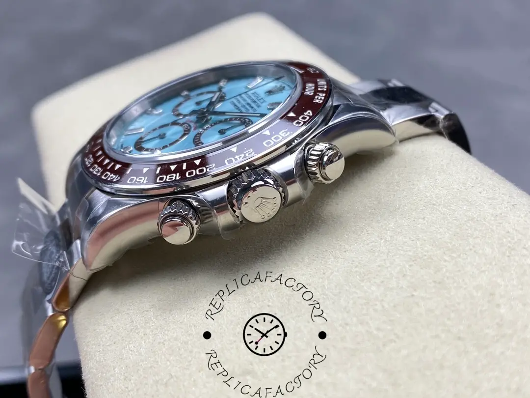 Crown and pushers view of the Rolex Cosmograph Daytona 126506 showing detailed finishing.