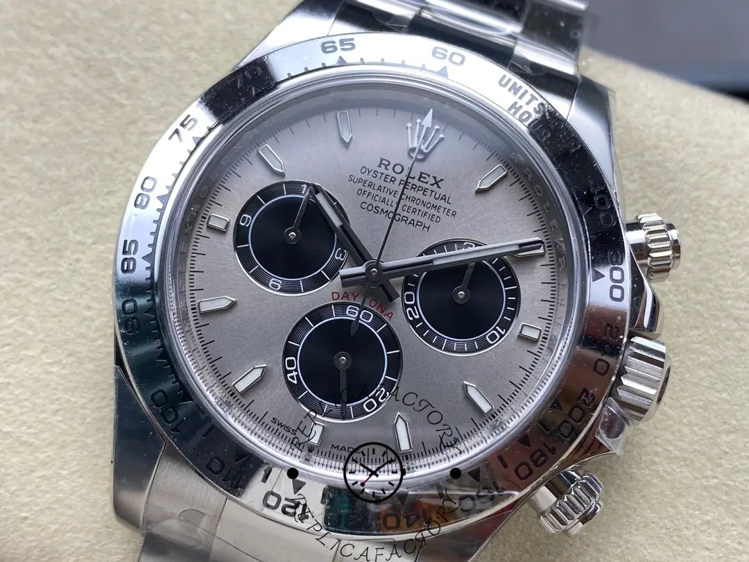 Detailed frontal shot of Rolex Daytona 126509-0003 focusing on markers, subdials, and the red Daytona text.
