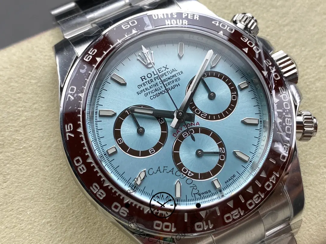 Close-up of Rolex Daytona 126506 showing ice-blue dial, brown subdials, and tachymeter bezel.