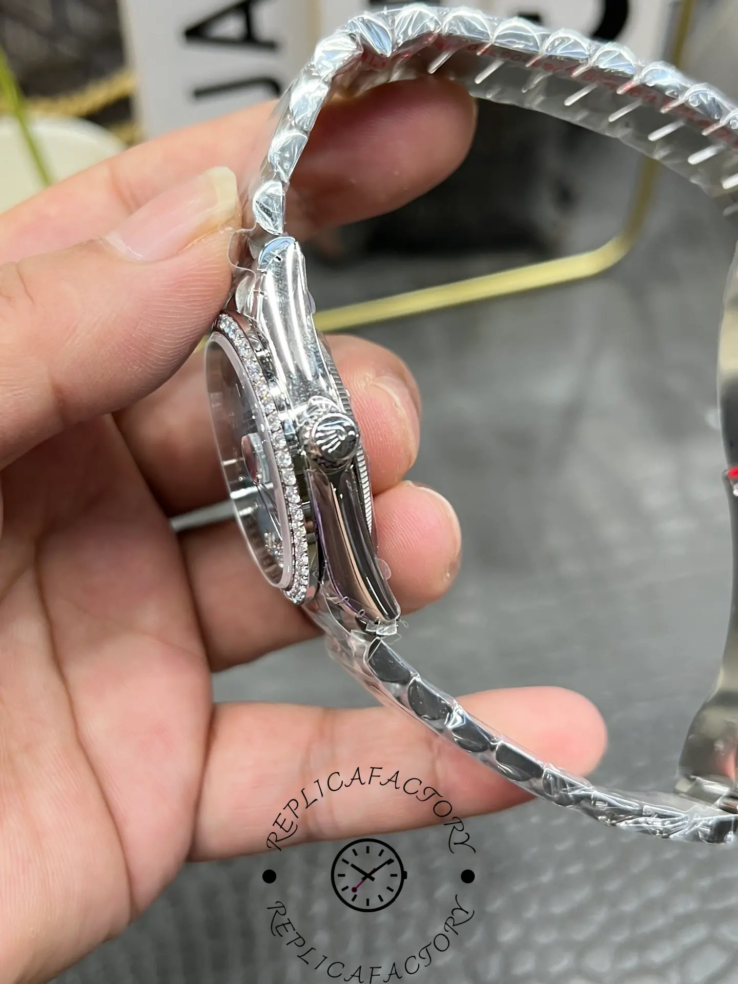 Bracelet view of Rolex Day-Date 128349RBR-0031 President bracelet in polished steel.