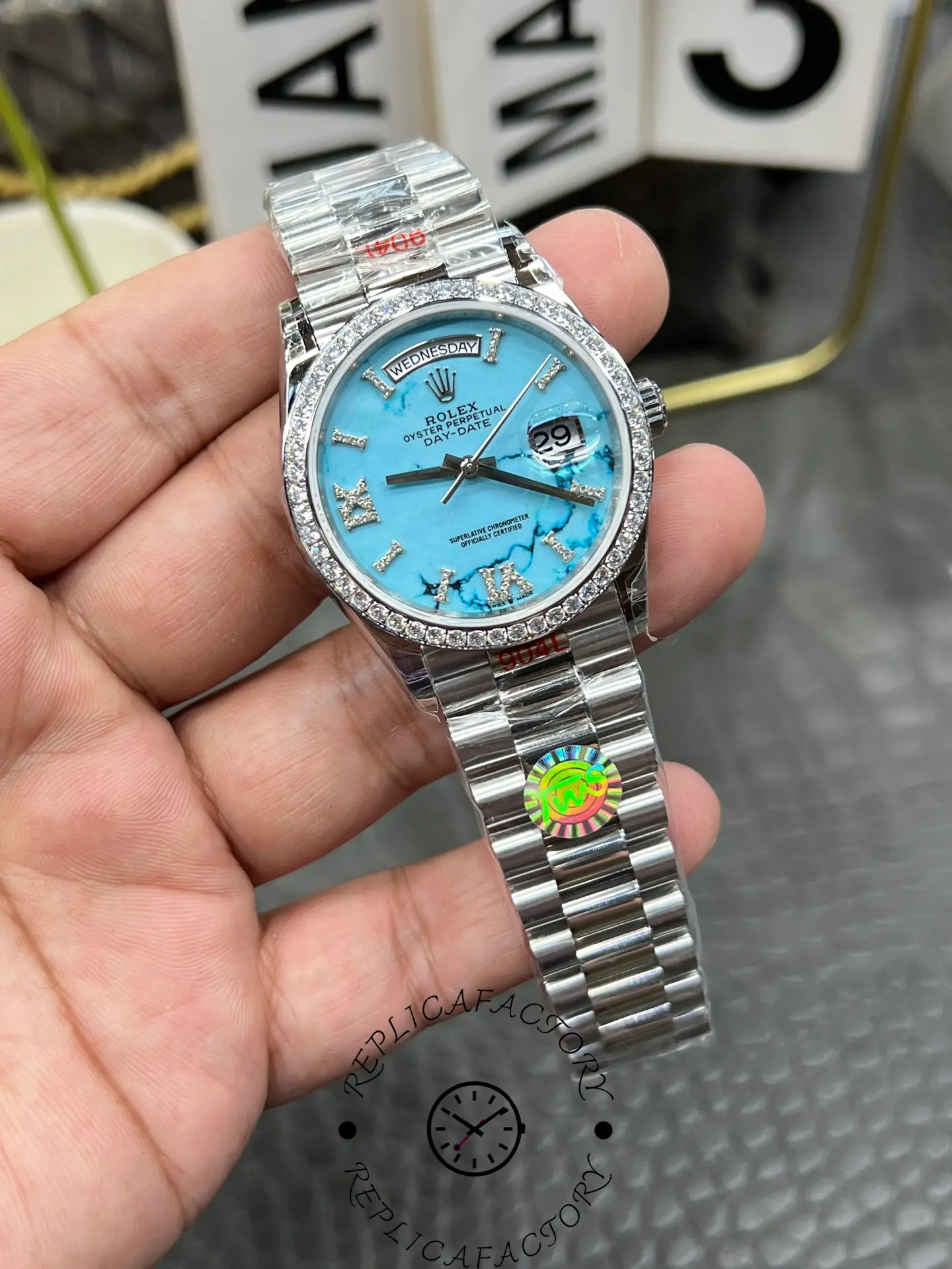 Angled front view of Rolex Day-Date 128349RBR-0031 highlighting diamond Roman numeral markers.