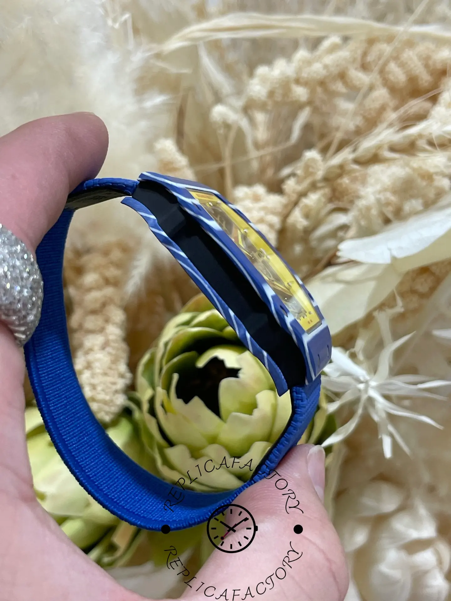 Side profile of Super Clone Richard Mille RM 67-02 Fernando Alonso Azul showing ultra-thin blue case and fabric strap.