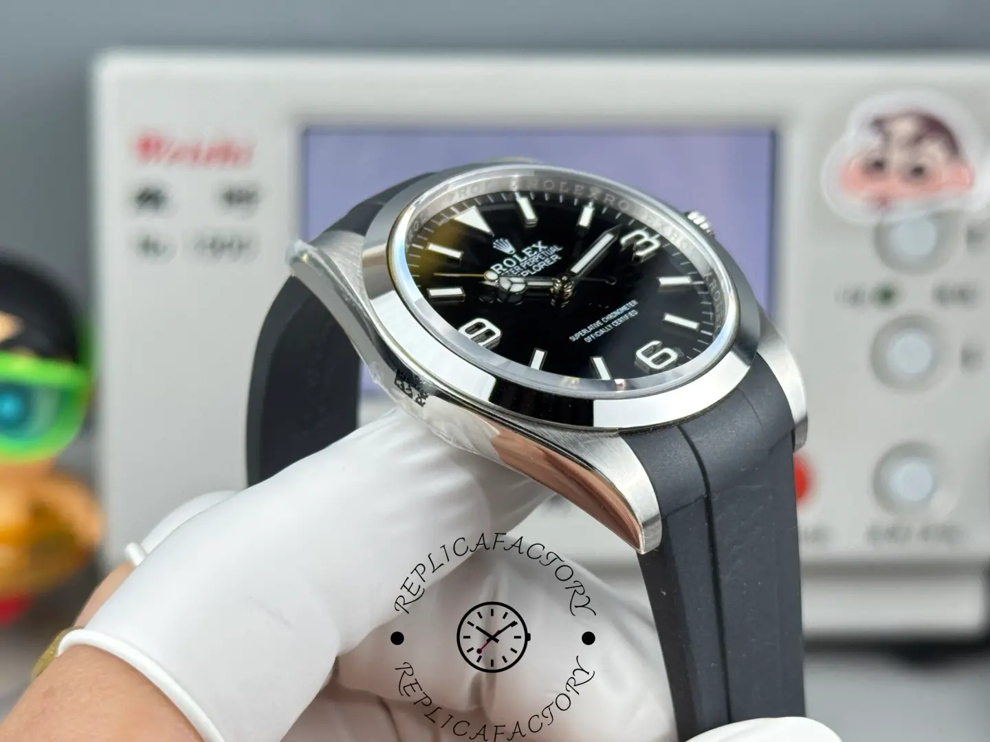 Angled side view of Rolex Explorer 224270 showing polished bezel, brushed case profile, and black rubber strap.