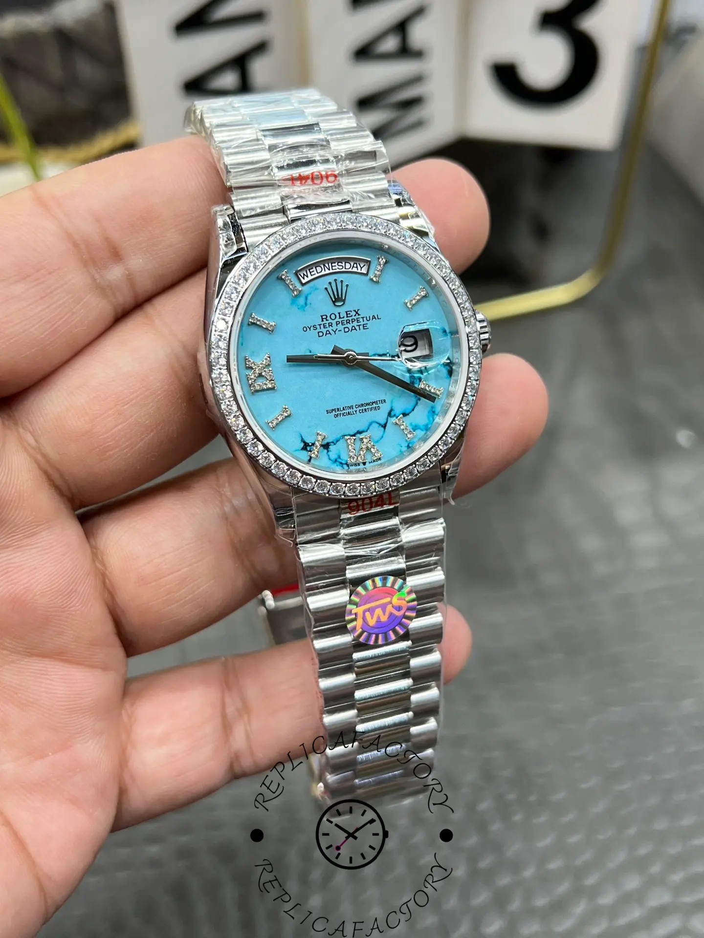 Date window detail of Rolex Day-Date 128349RBR-0031 with Cyclops magnifier.