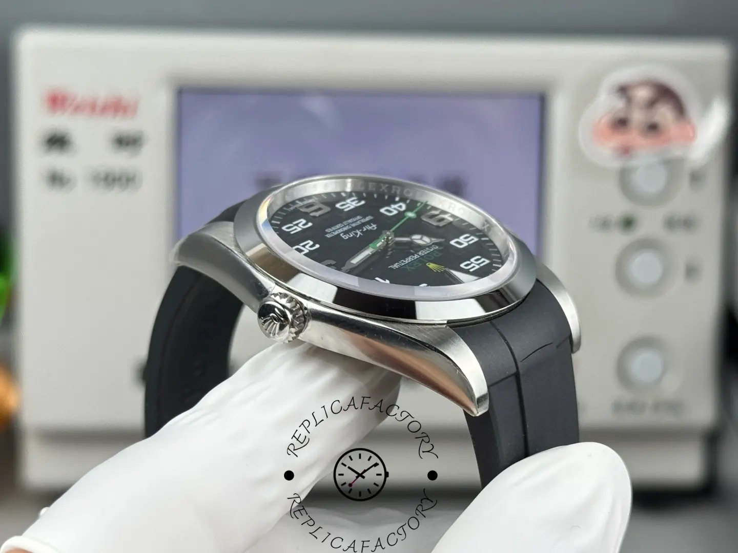 Crown-side view of Rolex Air-King 126900 replica with engraved crown logo.