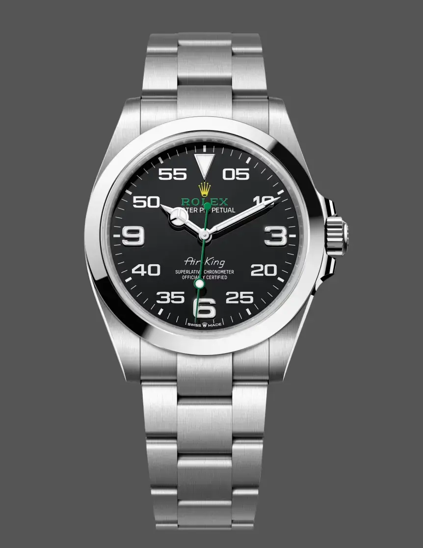Front view of Rolex Air-King 126900 with black dial, 3-6-9 Arabic numerals, green seconds hand, and Oyster bracelet.