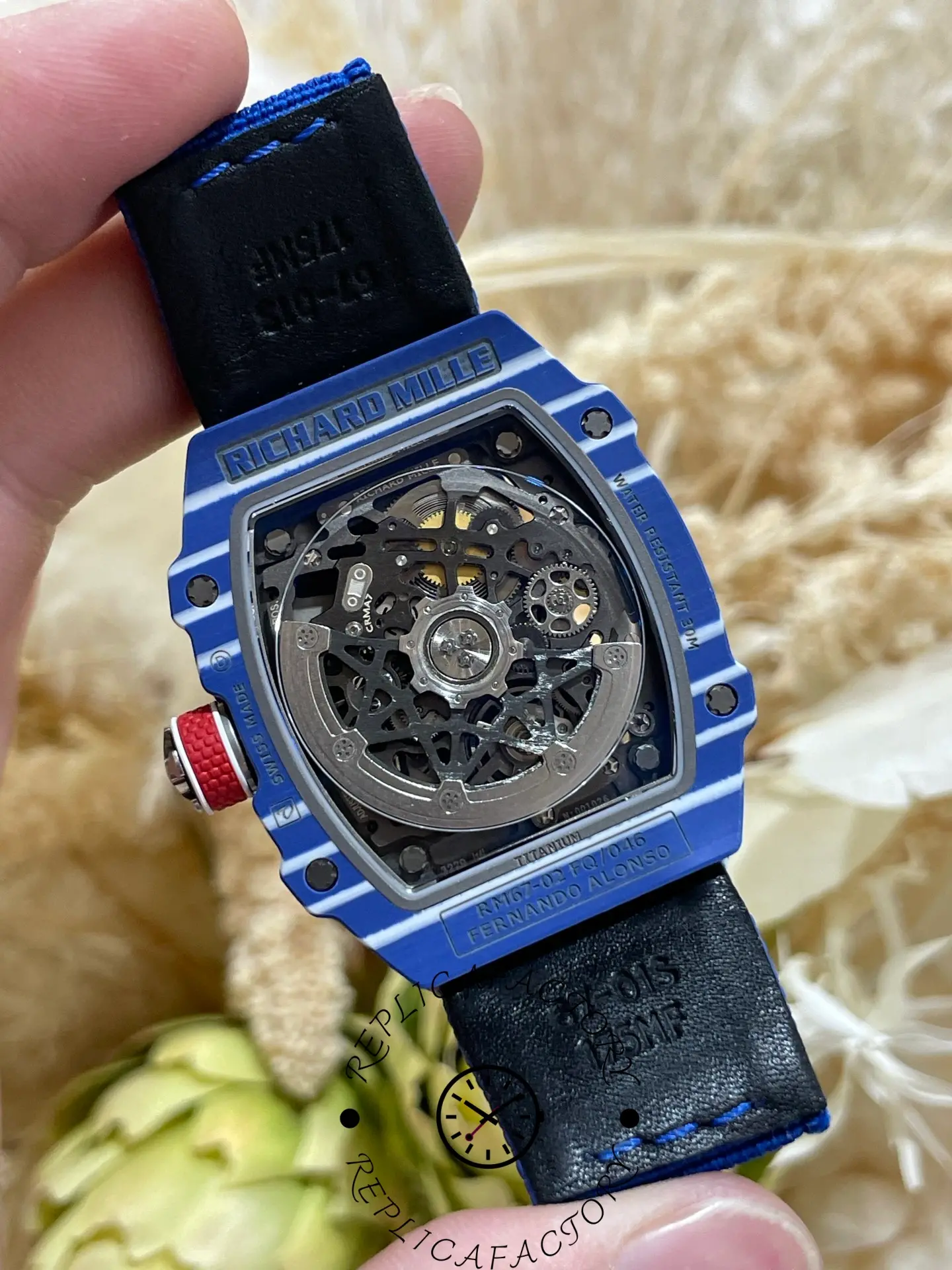 Case back view of Super Clone Richard Mille RM 67-02 Fernando Alonso Azul with skeleton movement and Fernando Alonso engraving.