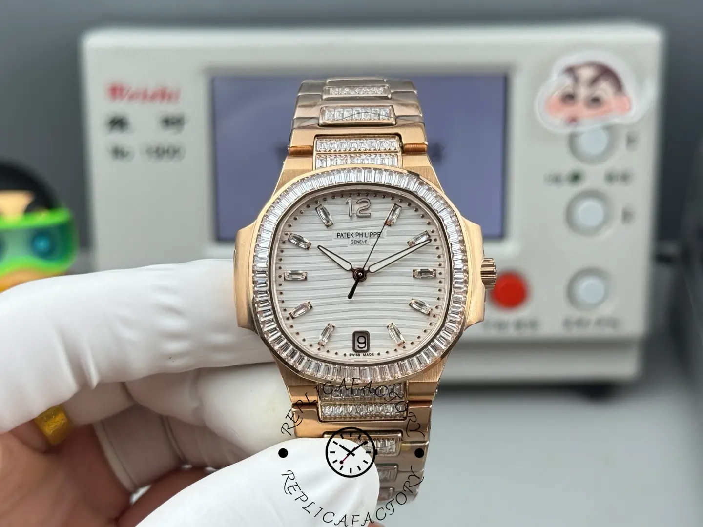 Front view of Patek Philippe Nautilus 7014/1R-001 replica showing silver dial, diamond bezel and rose gold bracelet.