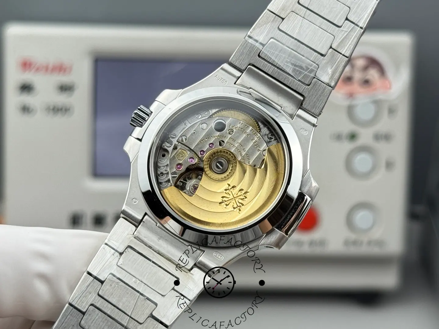 Exhibition case back of Nautilus 7014-1G-001 replica revealing automatic movement and rotor.