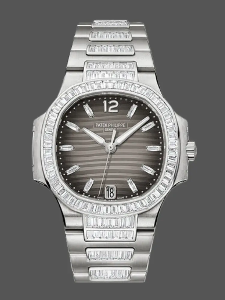 Front view of Patek Philippe Nautilus 7014-1G-001 replica showing charcoal gray embossed dial, baguette bezel, and integrated bracelet.