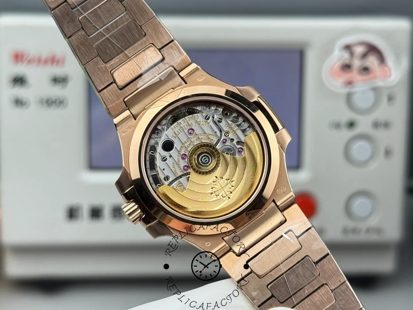 Case back view of Patek Philippe Nautilus 7014/1R-001 replica showing automatic movement through transparent back.