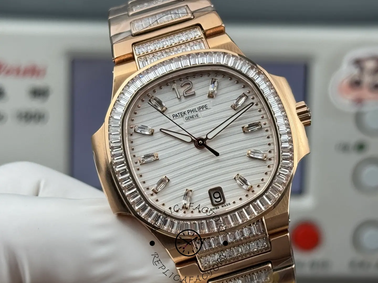 Close-up of dial on Patek Philippe Nautilus 7014/1R-001 replica showing applied crystal hour markers.