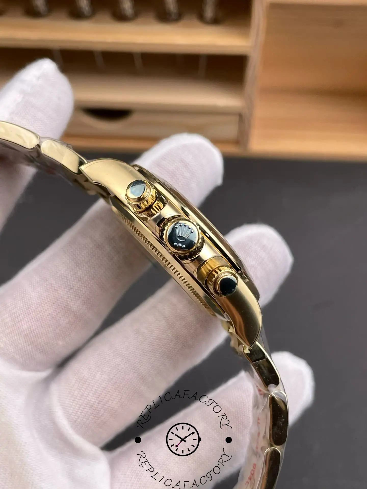 Right side view of Rolex Daytona 116508 showing gold screw-down crown and chronograph pushers.