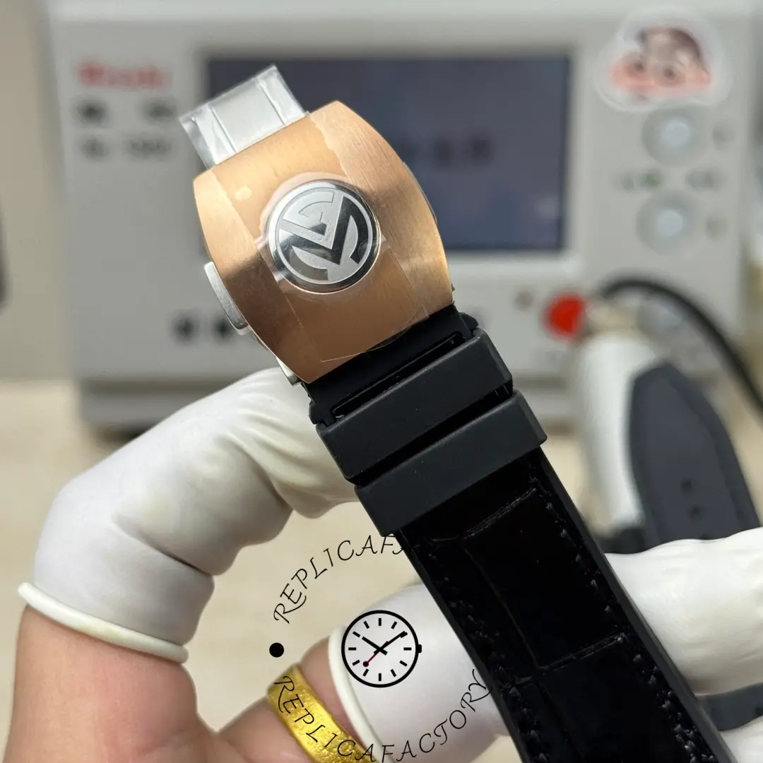 Clasp close-up of Franck Muller V45 CX Tourbillon showing rose gold folding buckle with logo.