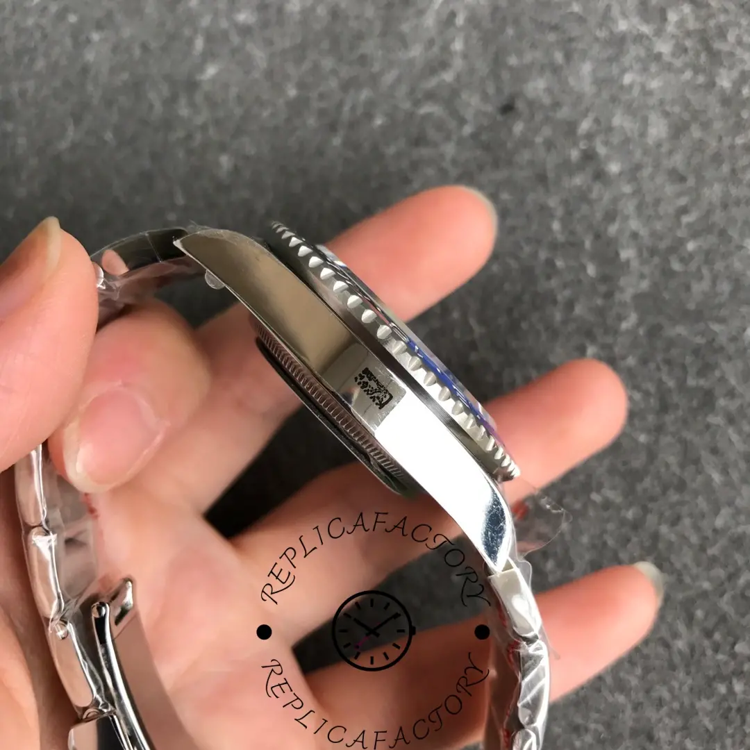 Case side view of Rolex GMT-Master II 116710BLNR highlighting bezel teeth and case thickness.