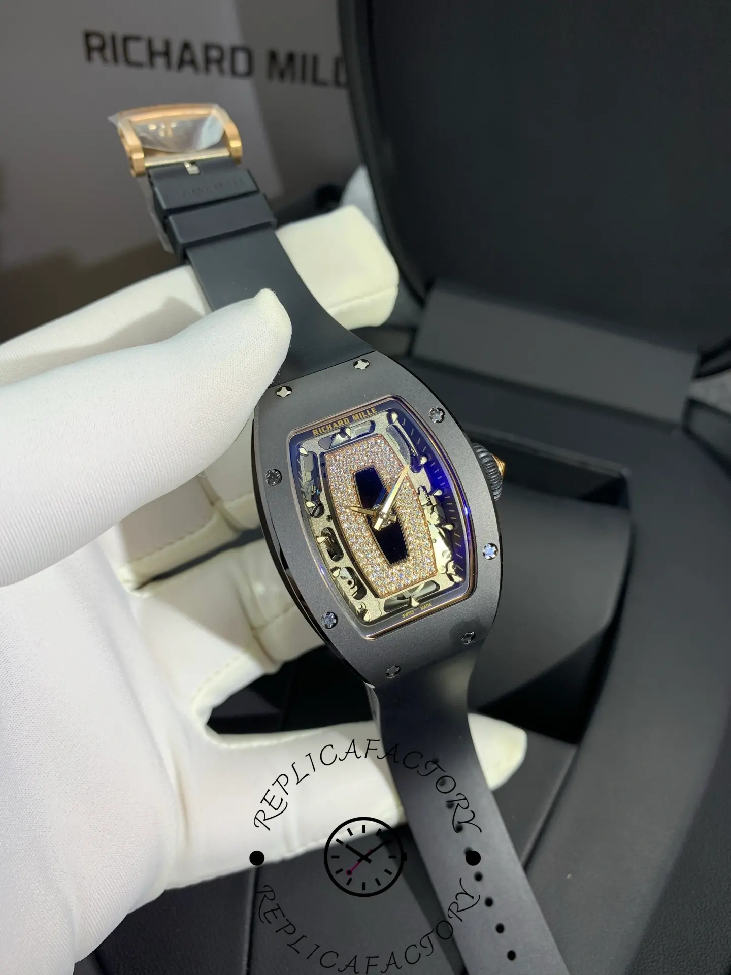 Angled front view of Richard Mille RM 07-01 showing diamond-set skeleton dial and black rubber strap.