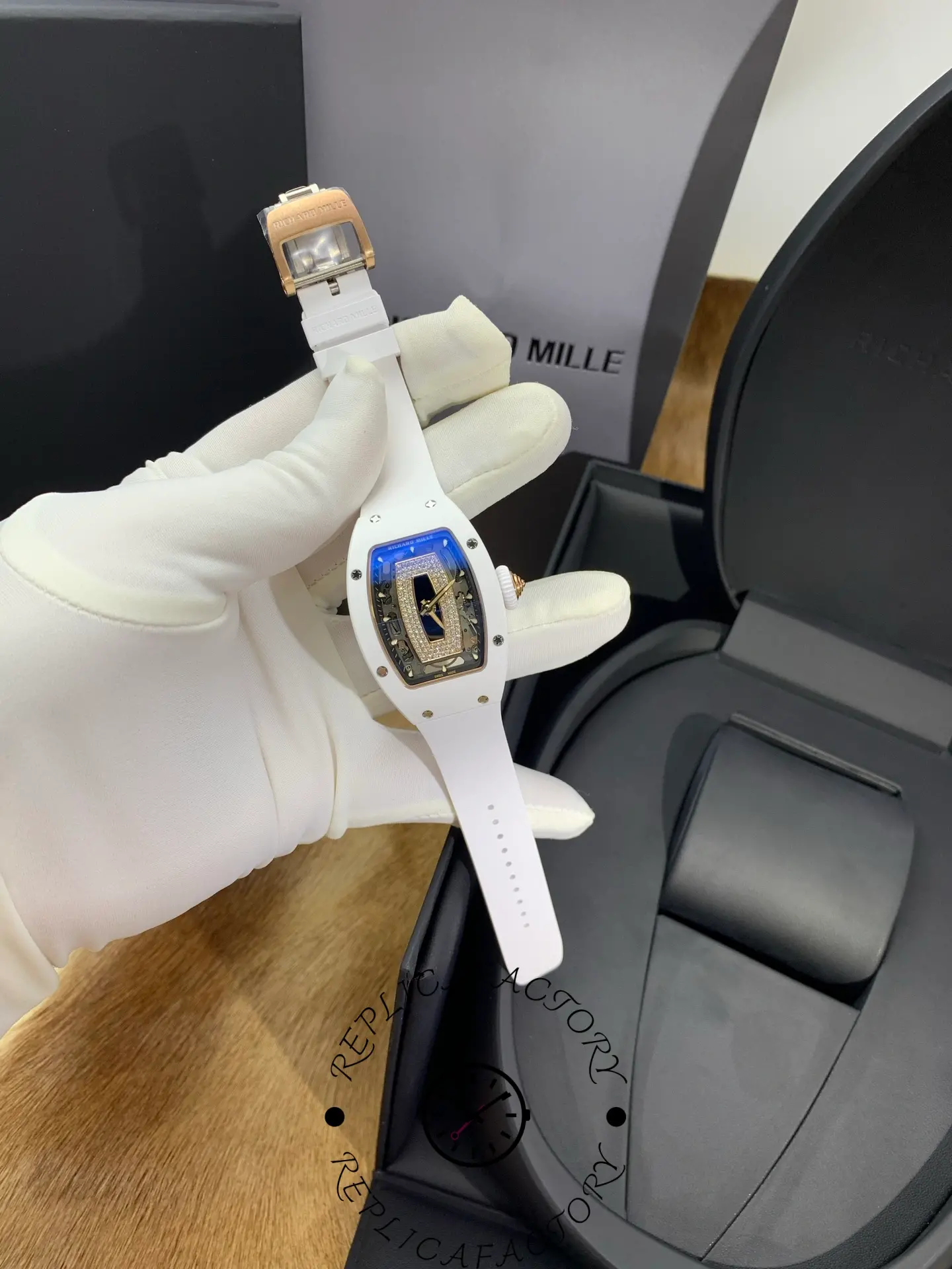 Clasp detail of Richard Mille RM 07-01 with rose gold tone deployant clasp.