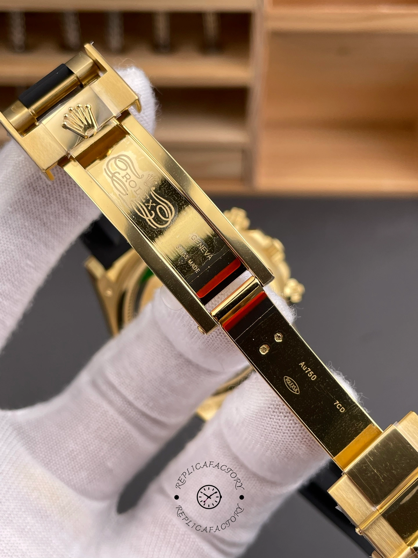 Rolex Daytona 126518LN 0014, clasp close-up with protective red sticker.