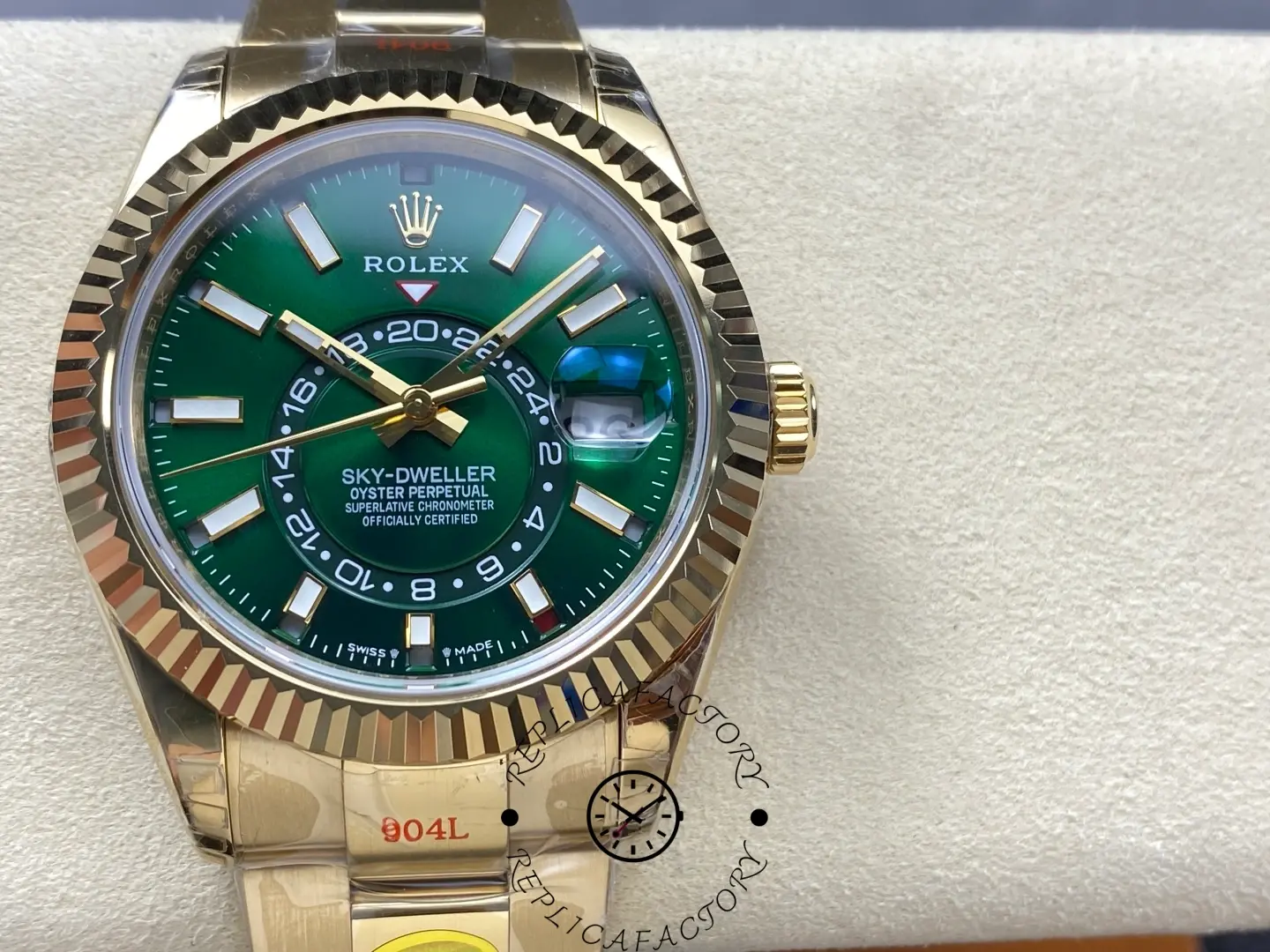 Angled front view of Rolex Sky-Dweller 336938 highlighting gold-tone case and Cyclops date lens.