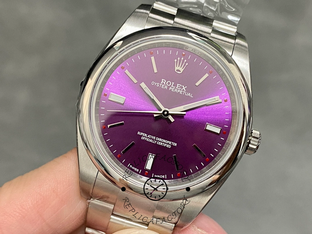 Rolex Oyster Perpetual Air-King 114200, grape red index dial close-up, smooth bezel.