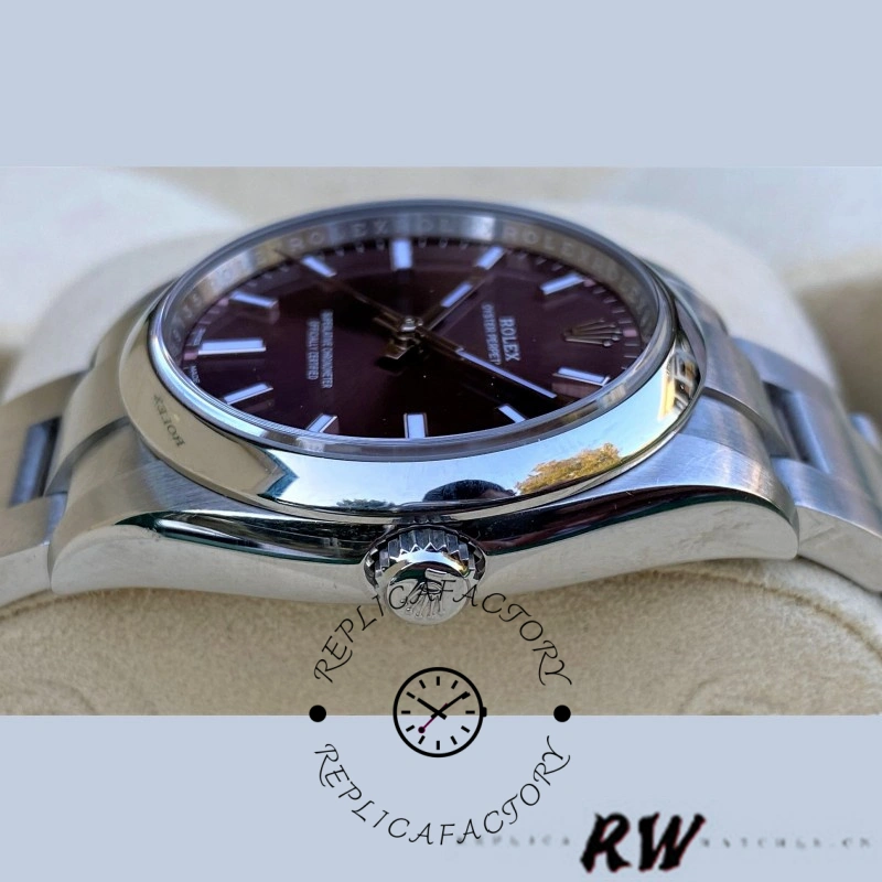 Rolex Oyster Perpetual Air-King 114200, side profile on stand showing smooth bezel and case.