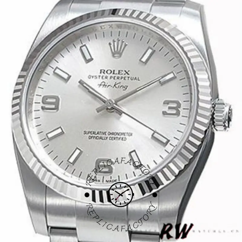 Rolex Air-King 114234, silver dial close-up showing hour markers and fluted bezel.