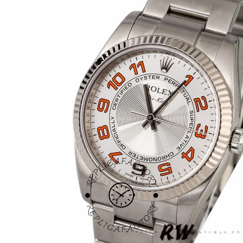 Rolex Oyster Perpetual Air-King 114234, angled view showing fluted bezel and silver orange dial.
