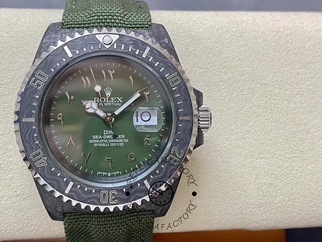 Rolex Sea-Dweller DiW Carbon HUNTER ARABIC close-up, green dial with Arabic numerals, carbon bezel detail.