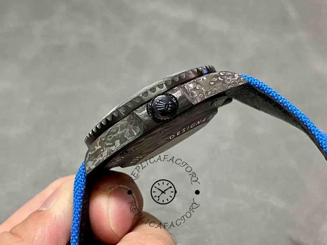 Rolex Sea-Dweller DiW Carbon Fiber, side profile showing crown and strap fit.