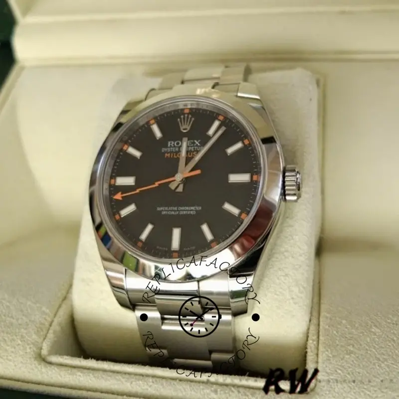 Rolex Milgauss 116400 on cushion, showing black dial and orange lightning seconds hand.