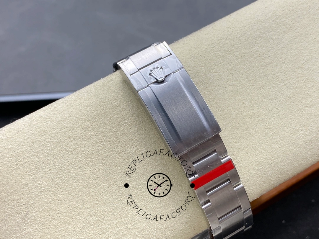 Rolex Explorer 124270 0001, clasp detail on cushion showing brushed finish.