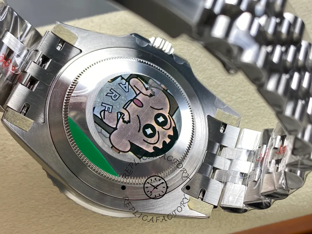 Rolex GMT-Master II M126710GRNR 0003, caseback opened showing movement rotor detail.