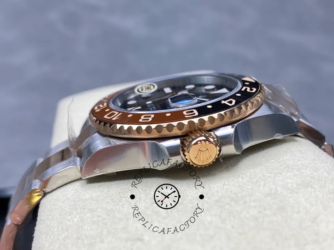 Low side angle of Rolex GMT-Master II 126711CHNR, showing Everose tone case flank.