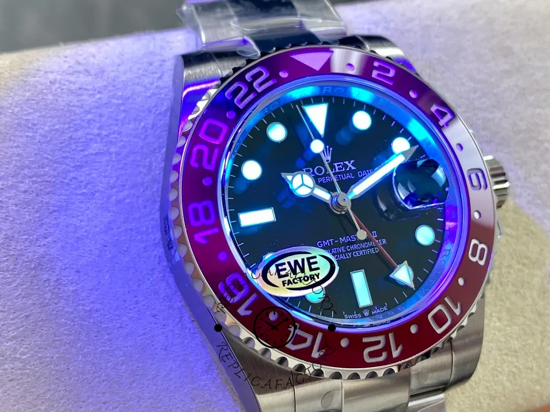 Lume shot of the Rolex GMT-Master II 126710BLRO 0002 showing glowing markers and hands.
