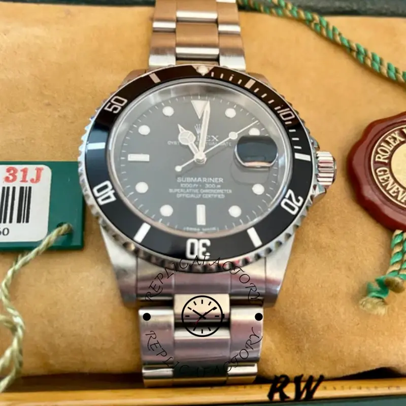 Rolex Submariner 16610 full watch on cushion, black dial and bezel with steel bracelet.