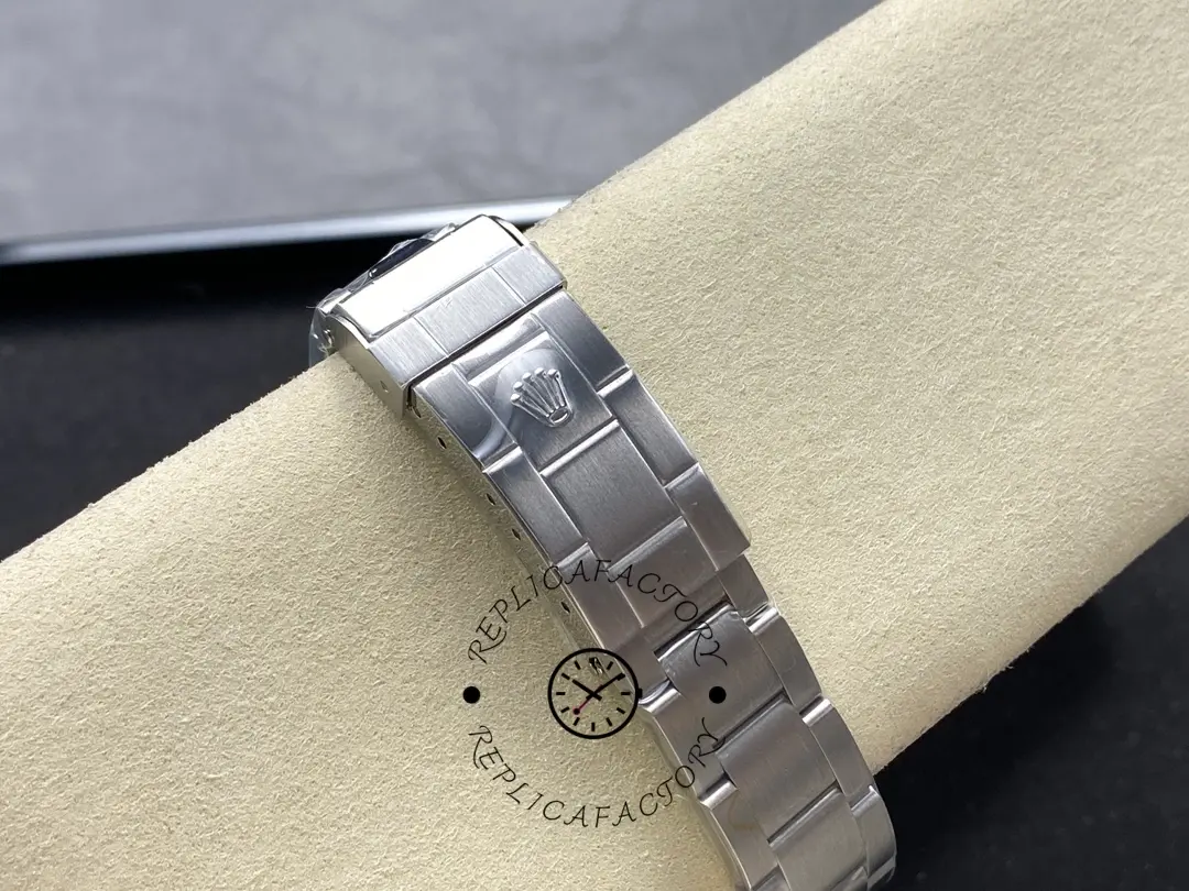 Rolex Submariner 16610 clasp close-up, showing folding clasp and safety lock.